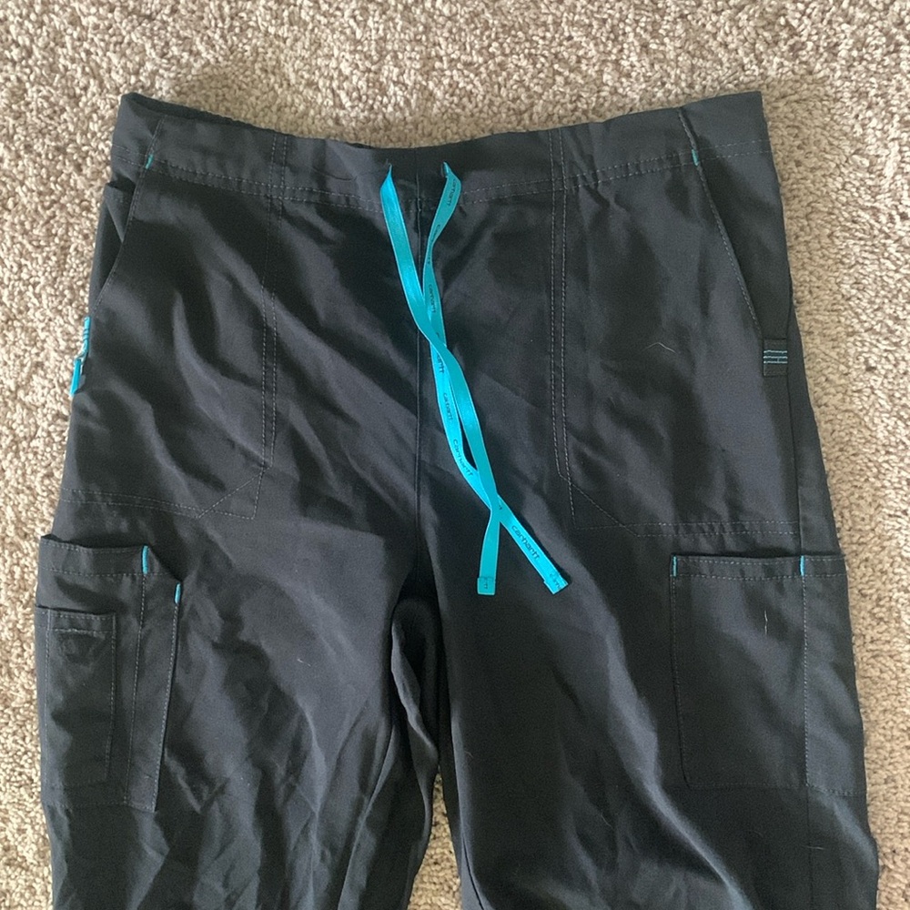 Black Carhartt scrub pants